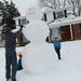David Rink places an arm into a giant snowman as his sons Justin, 8 and Brandon, 6, stand by on Wednesday, Feb. 27, 2013 on Glen Leven Rd. Melanie Maxwell I AnnArbor.com